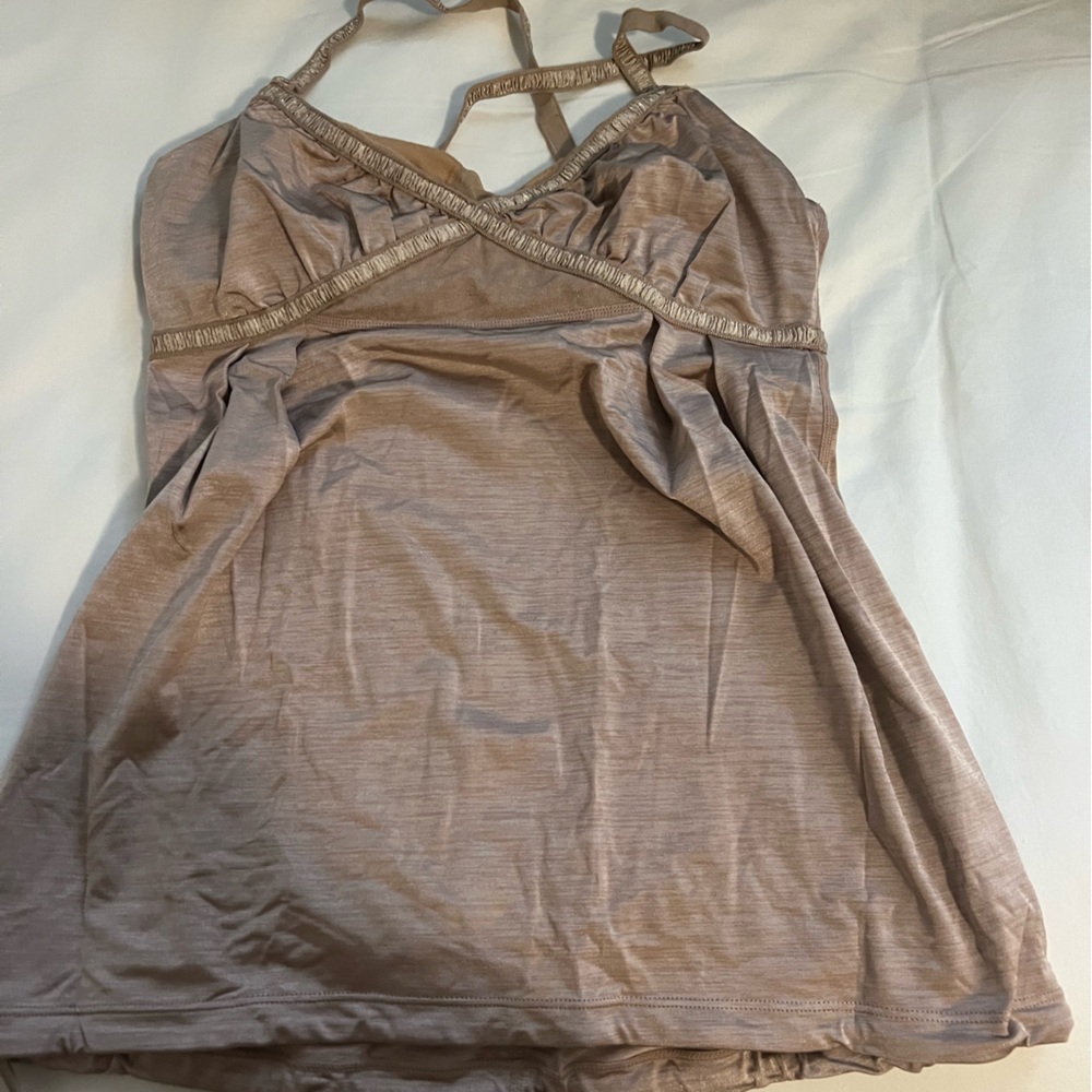 Cute and unique Lululemon athletic tank top never worn size 4